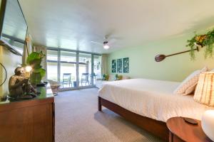 a bedroom with a bed and a living room at Island Oasis Near Kaanapali Beach and Black Rock in Lahaina +34 photos