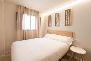Postel nebo postele na pokoji v ubytování Casa Garrell