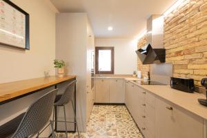 Kuchyň nebo kuchyňský kout v ubytování Casa Garrell