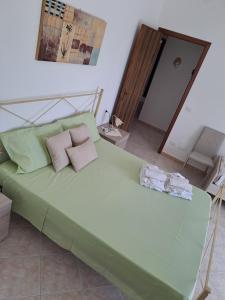 Posteľ alebo postele v izbe v ubytovaní La Casa Di Donato E Maria
