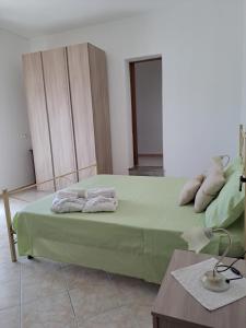 Posteľ alebo postele v izbe v ubytovaní La Casa Di Donato E Maria