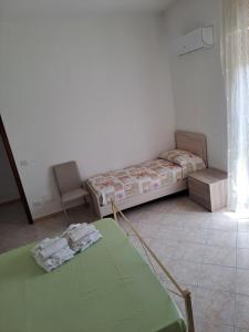 Posteľ alebo postele v izbe v ubytovaní La Casa Di Donato E Maria