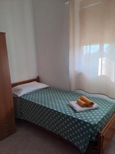 Posteľ alebo postele v izbe v ubytovaní La Casa Di Donato E Maria