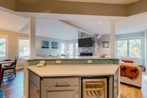 a kitchen with an island in a room at Après Chalet in Newry +58 photos