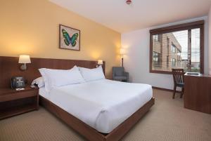 Hotel Habitel Select客房内的一张或多张床位