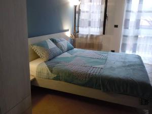 Giường trong phòng chung tại La casa di Marigio'