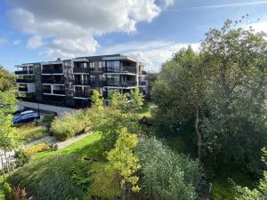 an aerial view of an apartment building with a garden at Araliya in Krakow