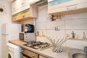 Kuchyň nebo kuchyňský kout v ubytování L'escale - Ultracentral