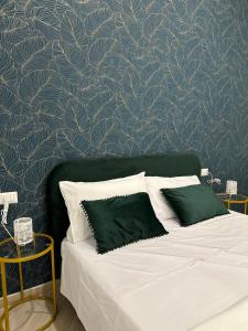 Un pat sau paturi într-o cameră la Del Carmine 23