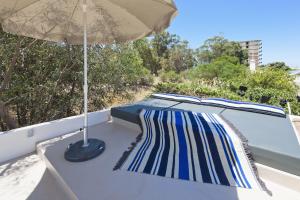 Balkon atau teras di Costa d'Oiro Ambiance Village