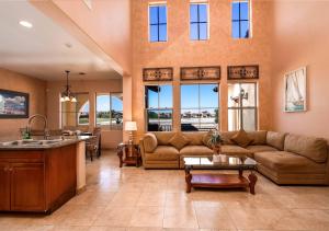a living room with a couch and a table at Condo 31-1 Right in front of the Pool with WiFi in San Felipe
