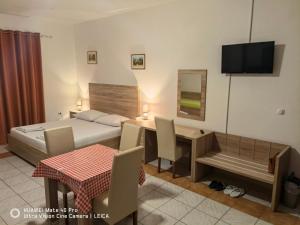 Postel nebo postele na pokoji v ubytování Lovely Bosnian Home