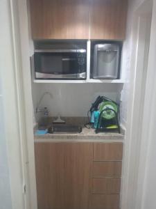 Virtuvė arba virtuvėlė apgyvendinimo įstaigoje Apartamento ao lado do metro da Cinelândia e Consulado Americano