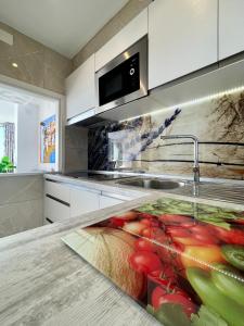 Kuchyň nebo kuchyňský kout v ubytování Magnifique appartement en front de mer, Caneylles