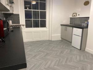 Kuchyň nebo kuchyňský kout v ubytování Bridgewater Flat