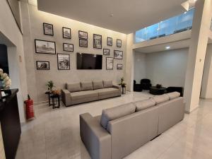 TV a/nebo společenská místnost v ubytování Hotel Supremo