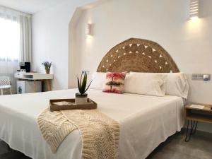 Postel nebo postele na pokoji v ubytování Hostal Aires del Mar