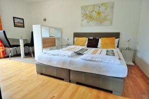 Posteľ alebo postele v izbe v ubytovaní Appartements Peter