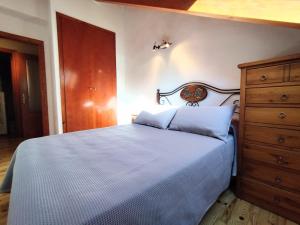 Postel nebo postele na pokoji v ubytování CHECK-IN CASAS Casa Pedro