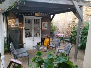 Ein Patio oder anderer Außenbereich in der Unterkunft Gîte la comète