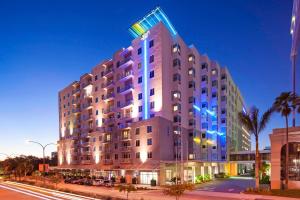 a rendering of a hotel at night at Aloft by Marriott Sarasota in Sarasota