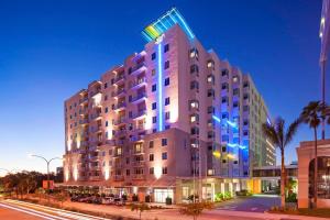 a rendering of a hotel at night at Aloft Sarasota in Sarasota