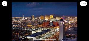 a view of a city at night at Amazing view 18th floor at Palms place Las Vegas in Las Vegas