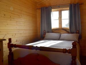 Giường trong phòng chung tại Baytree Lodge - Uk13322