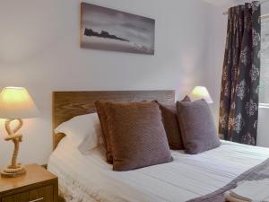 Llit o llits en una habitació de North Bay Sands Apartment 2- Uk2630
