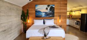 Postel nebo postele na pokoji v ubytování Bombua Beach House