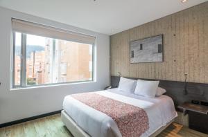 Postel nebo postele na pokoji v ubytování Hotel B3 Virrey