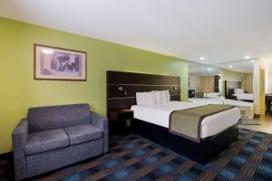 Letto o letti in una camera di SureStay Hotel by Best Western Manning