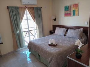 A bed or beds in a room at Hotel Gran Lido