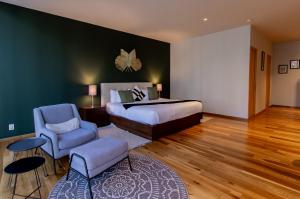 En eller flere senge i et værelse på Capitalia Temistocles Polanco