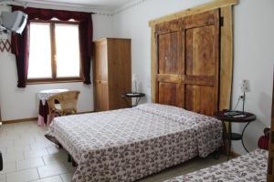 Postel nebo postele na pokoji v ubytování B&B Navertino