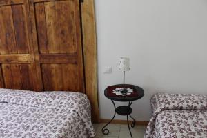 Postel nebo postele na pokoji v ubytování B&B Navertino