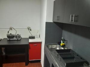 Kuchyň nebo kuchyňský kout v ubytování OBhouse Apartment, para sentirse como en casa! + 12 fotografií