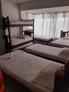 Postel nebo postele na pokoji v ubytování Hotel Los Estoraques