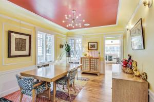 a dining room with a wooden table and chairs at Bernal Heights Spacious 3br Oasis Walk Score 96 in San Francisco