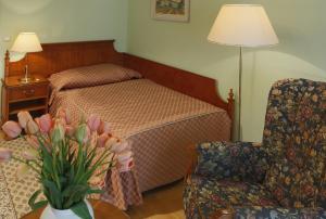 Posteľ alebo postele v izbe v ubytovaní Hotel Bristol