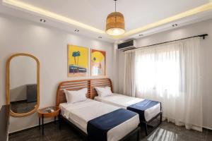 Säng eller sängar i ett rum på Travelholic AUC Residence