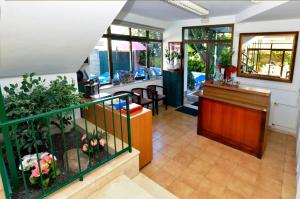 Posedenie v ubytovaní Hostal Magnolia