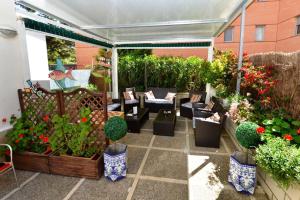 Vonkajšia záhrada v ubytovaní Hostal Magnolia