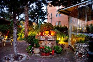 Vonkajšia záhrada v ubytovaní Hostal Magnolia