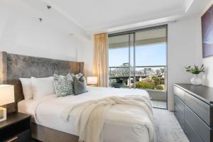 Ένα ή περισσότερα κρεβάτια σε δωμάτιο στο River Place hosted by AAB +57 φωτογραφίες