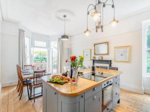 a kitchen with a sink and a counter top at Hillside in Paignton