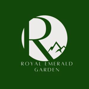 un logo vert et blanc pour un jardin royal émeraude dans l'établissement KIRAKU NAGI Niseko2BDRM Royal emerald garden 7, à Niseko