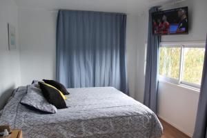 Postel nebo postele na pokoji v ubytování Lily Home