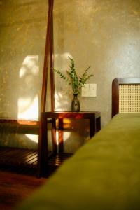 Ein Bett oder Betten in einem Zimmer der Unterkunft Boom Casa Homestay