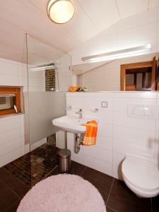 A bathroom at Adlerhorst , Gstan 31